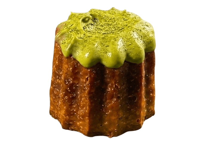 A Matcha Lava canelé with a molten Uji matcha crémeux core
